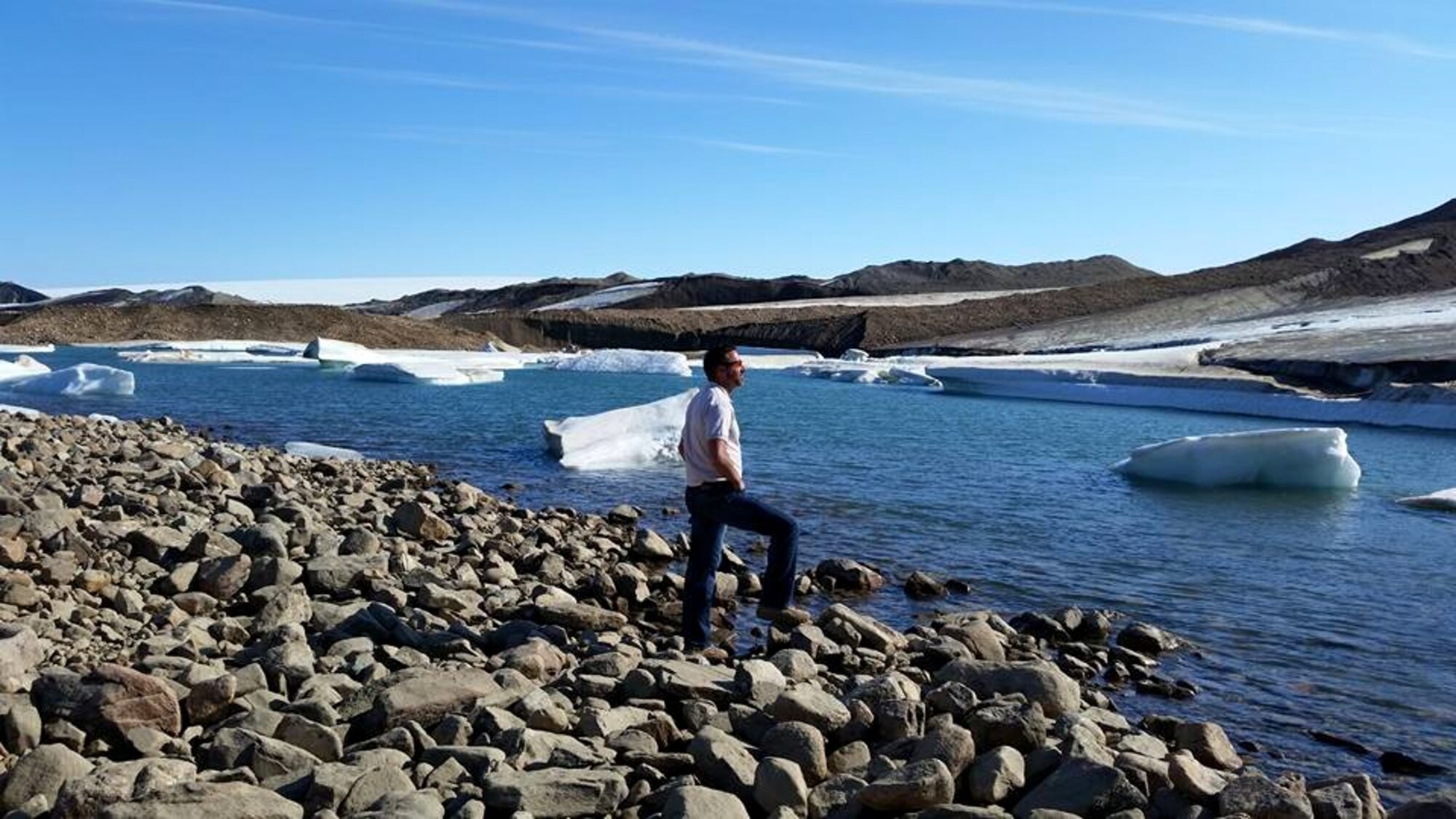 THULE AIR BASE, Greenland – Fred Brooks, 21st Civil Engineer Squadron installation management chief, looks over the terrain at Thule Air Base, Greenland. Brooks gathered stories of his life and published them in a book, detailing hardship and resiliency, to encourage others. (Courtesy Photo)