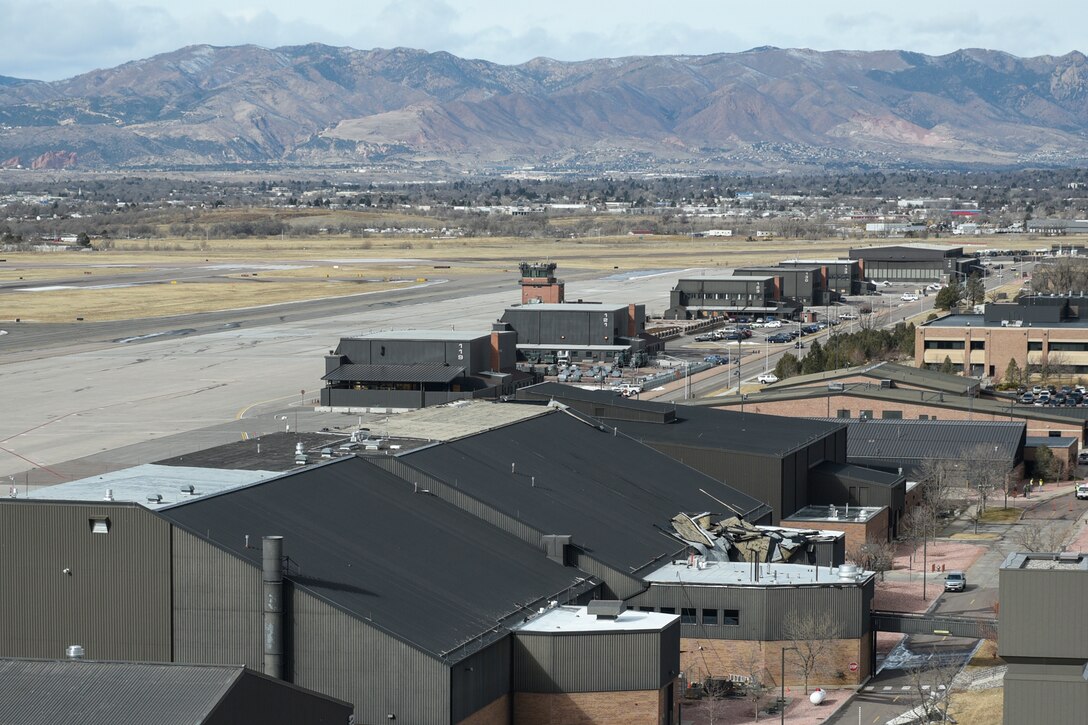 Wind causes building, vehicle damage