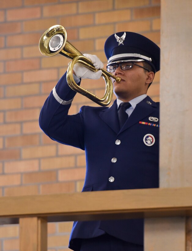 A member of Ellsworth’s Honor Guard performs Taps during Master Sgt. Scott W. Scovell’s memorial service inside the Freedom Chapel at Ellsworth Air Force Base, S.D., Jan. 11, 2017. Scovell passed away Jan. 3, and is survived by his wife and two children. (U.S. Air Force photo by Airman 1st Class Randahl J. Jenson)
