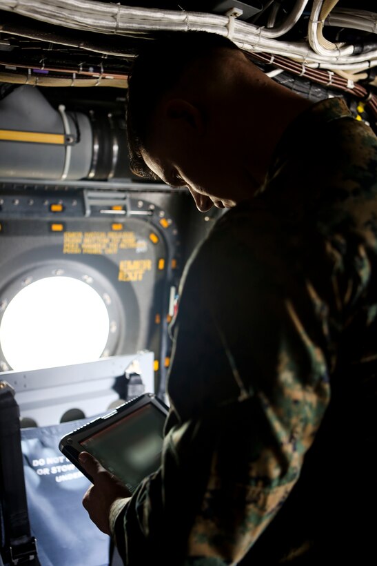 A Marine with 3rd Marine Aircraft Wing sets up the Hatch Mounted SATCOM (Satellite Communication) Antenna System (HMSAS) in preparation of the demonstration for the 3rd MAW commanding general aboard Marine Corps Air Station Miramar, Calif., Jan. 9. The HMSAS was developed for pre-deployment training in order to enhance communications for raid force and tactical recovery of aircraft and personnel (TRAP) missions, in preparation to support a Special Purpose Marine Air-Ground Task Force (SPMAGTF).