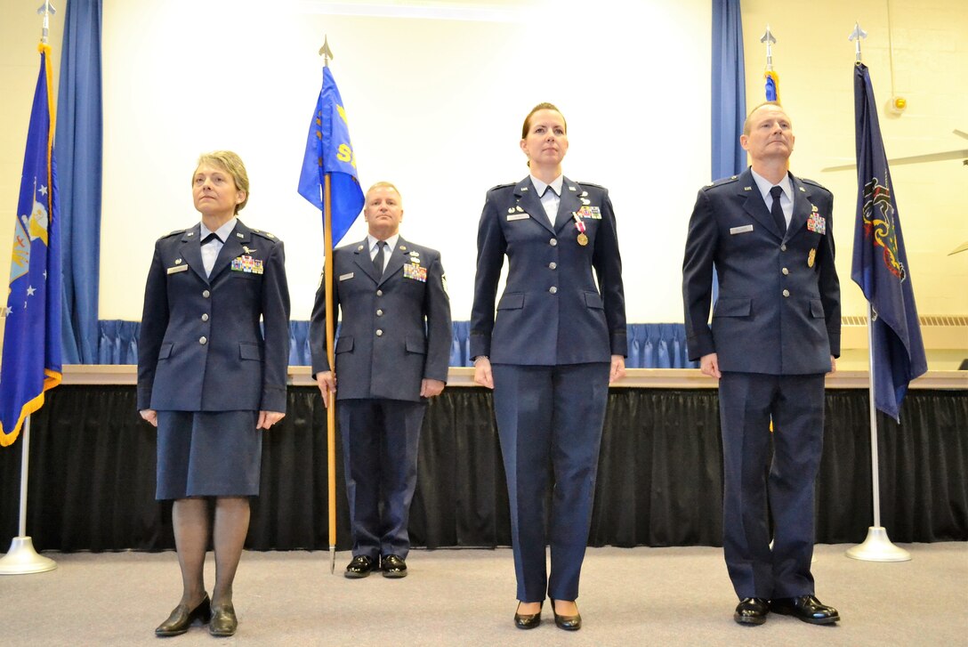 Left to right, Lt. Col. Claudia Malone, 111th Mission Support Group and 112th Cyberspace Operations Squadron commander, 1st Sgt. Brian Zarilla of the 111th Security Forces Squadron, Lt. Col. Christine Munch, 111th Attack Wing inspector general and Lt. Col. James Williams, 111th SFS commander, stand for the assumption of command ceremony at Horsham Air Guard Station, Pa., Jan. 8, 2017. Williams and Munch, who both began their military careers as enlisted security forces Airmen, traded leadership positions during January’s regularly scheduled drill (RSD). (U.S. Air National Guard photo by Tech. Sgt. Andria Allmond)