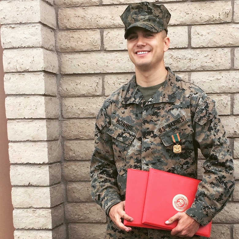 Sgt. Gabriel R. McInnis, engineer equipment mechanic with Bulk Fuel Company C, 6th Engineer Support Battalion, 4th Marine Logistics Group, poses for a photo after receiving a Navy and Marine Corps Achievement Medal at Luke Air Force Base, Ariz., Jan. 7, 2017. McInnis received the medal for his actions in preventing an assault of a family in Tempe, Ariz., Dec. 27, 2016. (Courtesy photo)