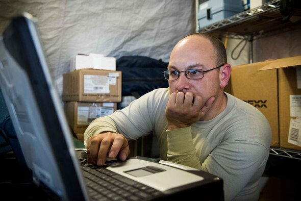 U.S. Air Force Tech. Sgt. Tomas Mata and Staff Sgt. Anthony LaCombe, 332nd Expeditionary Medical Group bioenvironmental engineering specialists, perform a work site assessment at a Marine Corps vehicle maintenance garage at the 407th Air Expeditionary Group, Jan. 5, 2016. The bioenvironmental specialists perform work site safety inspections for physical health hazards to ensure service members are safe. (U.S. Air Force photo by Staff Sgt. R. Alex Durbin)