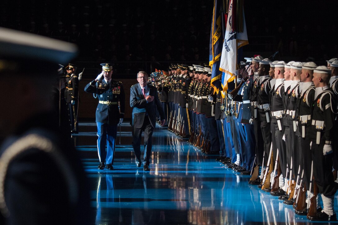 Army Col. Jason T. Garkey, left, commander of the 3rd U.S. Infantry Regiment known as "The Old Guard," escorts Defense Secretary Ash Carter as he inspects the Armed Forces Honor Guard during his farewell ceremony at Joint Base Myer-Henderson Hall, Va., Jan. 9, 2016. DoD photo by Army Sgt. James K. McCann