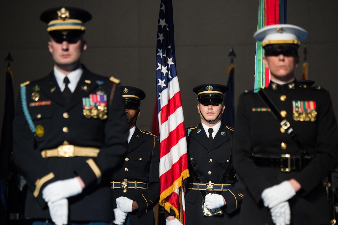 Members of the Armed Forces Honor Guard stand in formation during Defense Secretary Carter's farewell ceremony at Joint Base Myer-Henderson Hall, Va., Jan. 9, 2016. DoD photo by Army Sgt. James K. McCann 