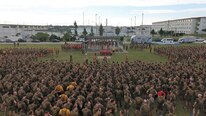 U.S. Marine Corps Maj. Gen. Richard L. Simcock II, commanding officer, 3rd Marine Division, leads a division wide motivational run at Camp Hansen, Okinawa, Japan, Jan. 12, 2017. Approximately 2,500 Marines and Sailors gathered as a division to celebrate the accomplishments and reputation of 'Caltrap Nation.' In his closing remarks, Simcock, a native of San Mateo, California, applauded the accomplishments of each Marine and Sailor of the division during his time in the command and thanked them for their service. 