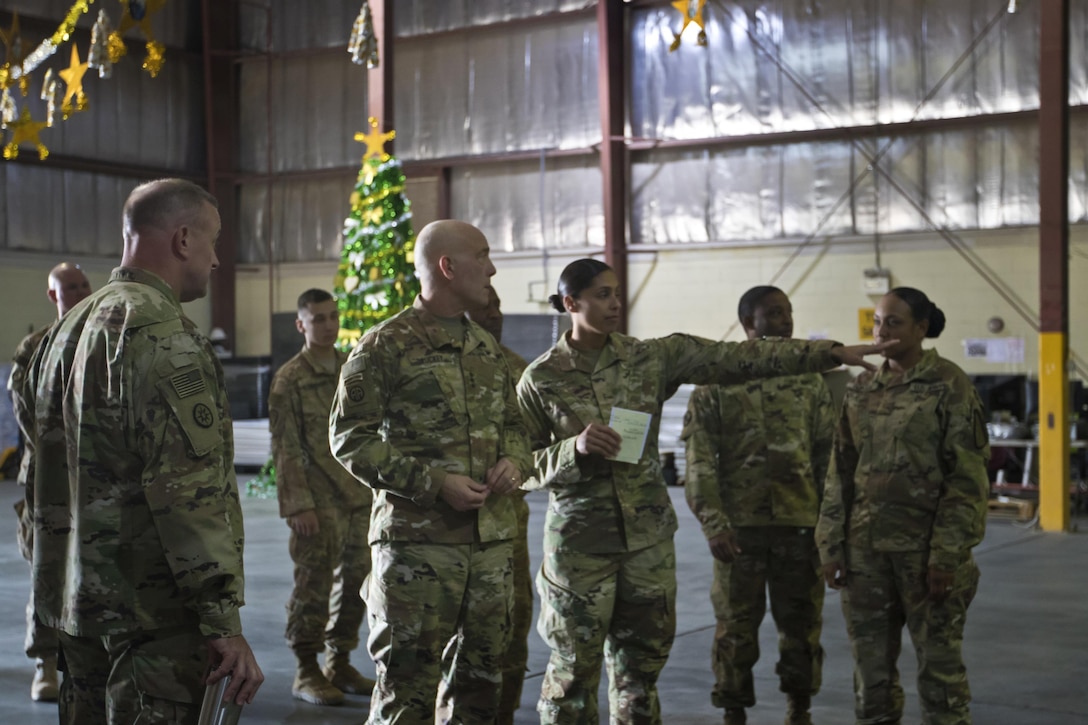 U.S. Army Reserve Commanding General, LTG Charles D. Luckey, tours the Iraq Train and Equipment Fund (ITEF) warehouse at Camp Arifjan, Kuwait, Jan. 4, 2017. 