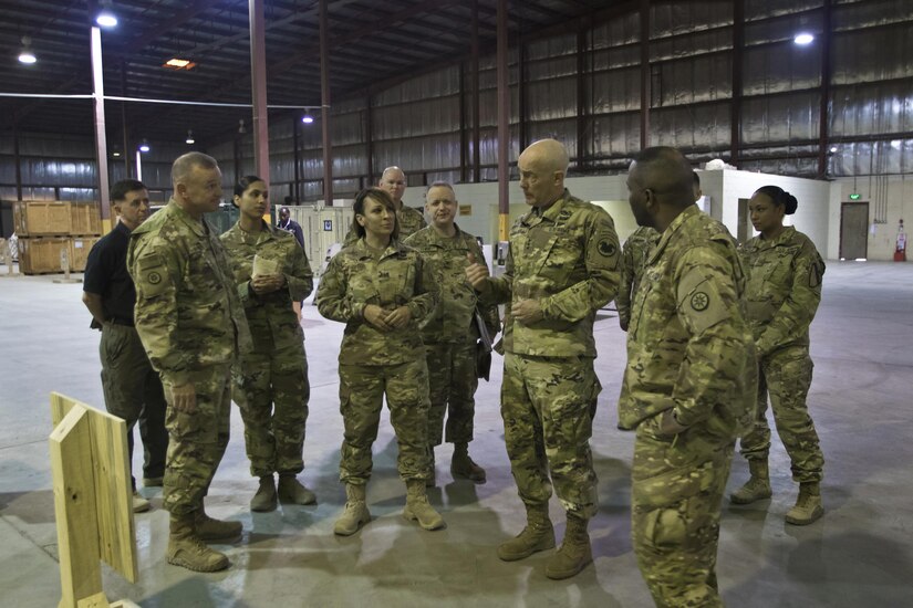 U.S. Army Reserve Commanding General, LTG Charles D. Luckey, explains the process of how equipment is moved through out the U.S. Central Command (USCENTCOM) Area of Responsibility (AOR) during a tour the Iraq Train and Equipment Fund (ITEF) warehouse at Camp Arifjan, Kuwait, Jan. 4, 2017. 