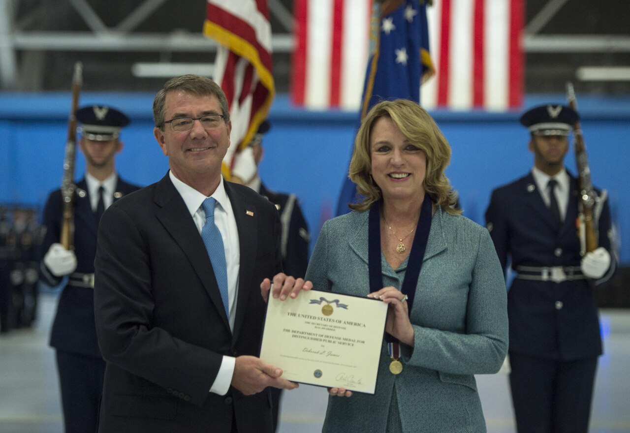 Defense Secretary Ash Carter presents Air Force Secretary Deborah Lee James with the Department of Defense Medal for Distinguished Public Service during James' farewell ceremony at Joint Base Andrews, Md., Jan. 11, 2017. DoD photo by Air Force Tech. Sgt. Brigitte N. Brantley