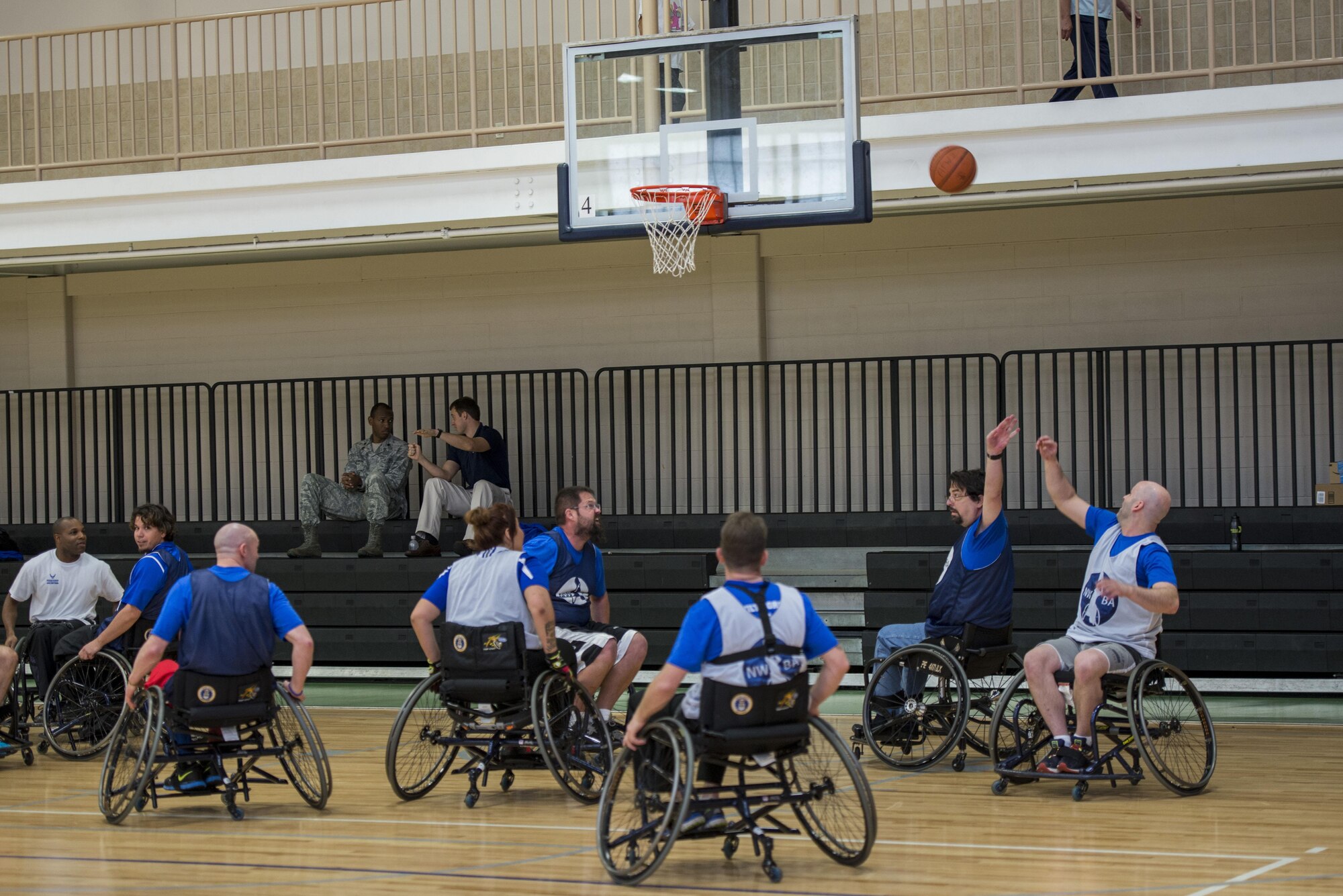 Air Force Wounded Warriors play wheelchair basketball during the 2017 Air Force Wounded Warrior Warrior CARE event Jan. 10, 2017, at JBSA-Randolph, Texas. The goal of the Warrior CARE event is to provide wellness events for seriously wounded, ill and injured military members, veterans and their caregivers.