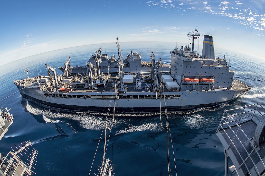 The fleet replenishment oiler USNS Yukon conducts a dual replenishment with the USS Carl Vinson and USS Princeton in the Pacific Ocean, Jan. 8, 2017. The Carl Vinson Carrier Strike Group is deployed to the western Pacific as part of the U.S. Pacific Fleet-led initiative to extend the command and control functions of 3rd Fleet into the region. Navy photo by Petty Officer 2nd Class Sean M. Castellano

