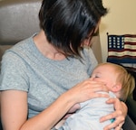 Bridget Owens prepares to breastfeed her son, James, in the lactation room at Brooke Army Medical Center at Joint base San Antonio-Fort Sam Houston June 24, 2016.