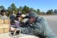 Senior Airman Joshua Slagel, a 43rd Air Mobility Squadron Joint Inspector, measures the shoring on a Humvee during a load inspection at the Arrival/Departure Airfield Control Group during a Deployment Readiness Exercise on Pope Army Airfield Jan. 9, 2017. Inspectors from the 43rd AMS act as a safety net to make sure cargo is properly prepared to be loaded onto Air Force aircraft. Improperly loaded cargo could be damaged or destroyed during an air drop. (U.S. Air Force photo/Master Sgt. Thomas J. Doscher)