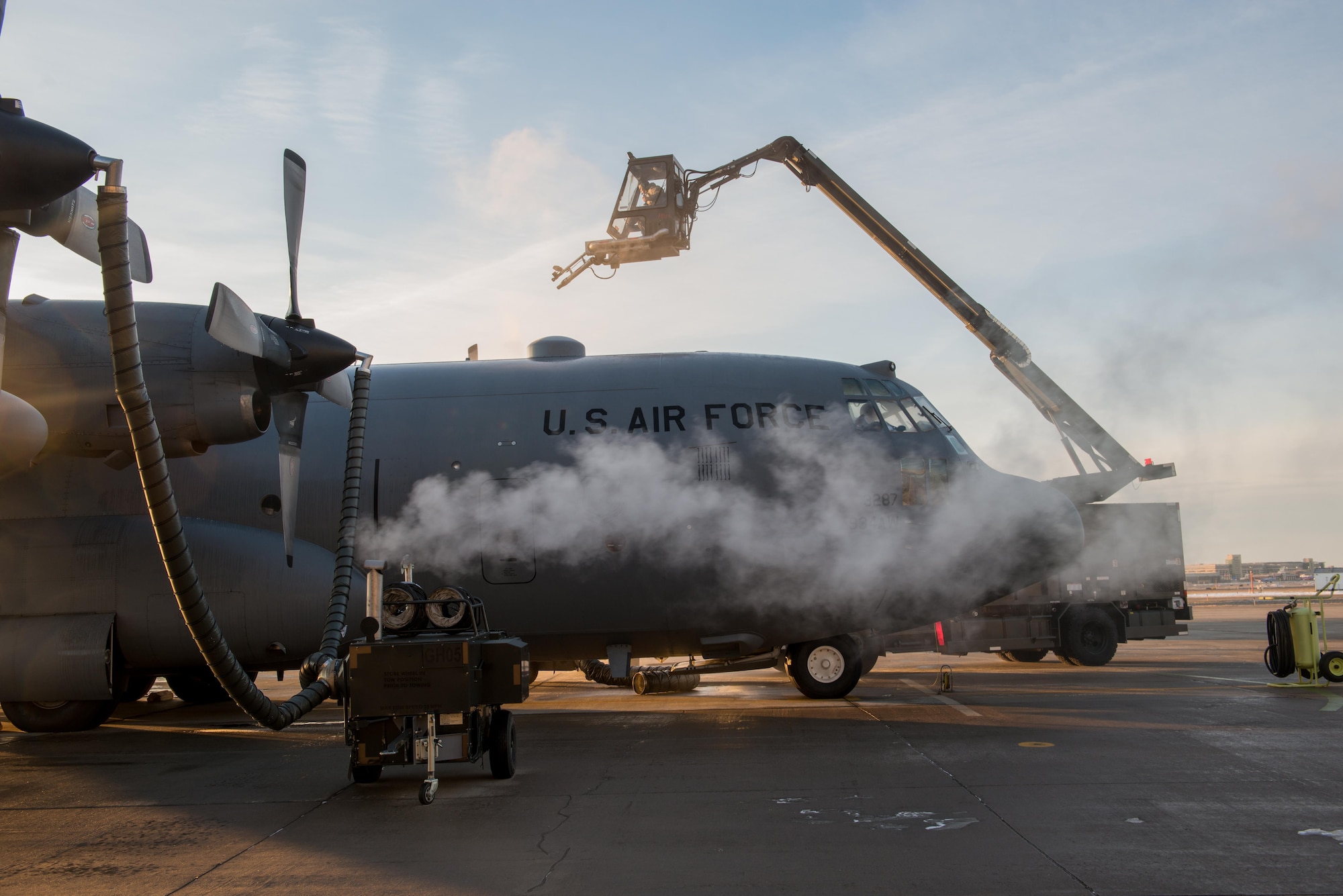 A 934th Airlift Wing C-130 is de-iced before takeoff for the Jan. 8 deployment.