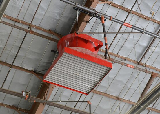 An uncovered fire suppression dispenser in Hangar 1820. (U.S. Air Force photo by Kenji Thuloweit)