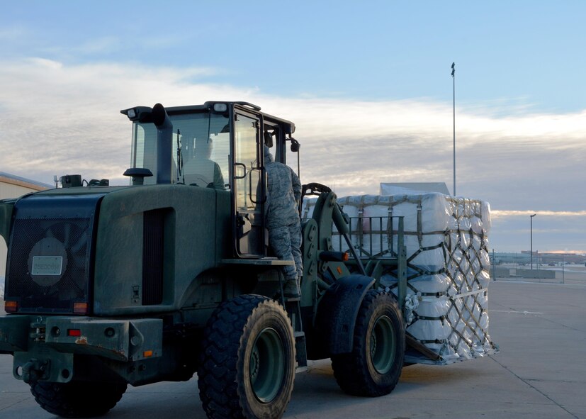 Staff Sgt. Breyden Miller of the 507th Logistics Readiness Squadron prepares to drive a 10K rough terrain forklift to the required destination during a deployment exercise Jan. 8, 2017, at Tinker Air Force Base, Okla. Reservists with the 507th Air Refueling Wing participated in the exercise in preparation for the upcoming nuclear operational readiness inspection in March 2016. (U.S. Air Force photo/Tech Sgt. Lauren Gleason)