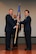 Lt. Col. Maureen H. McAllen receives the squadron guidon, as she assumes command of the 940th Mission Support Group, from Col. Craig C. Peters, 940th Air Refueling Wing commander, during a change of command ceremony Jan. 7, 2017, at Beale Air Force Base, California. A change of command ceremony is a long standing military tradition dating back to the Middle Ages that formally recognizes the transfer of authority from one commanding officer to another. (U.S. Air Force photo by Senior Airman Tara R. Abrahams)