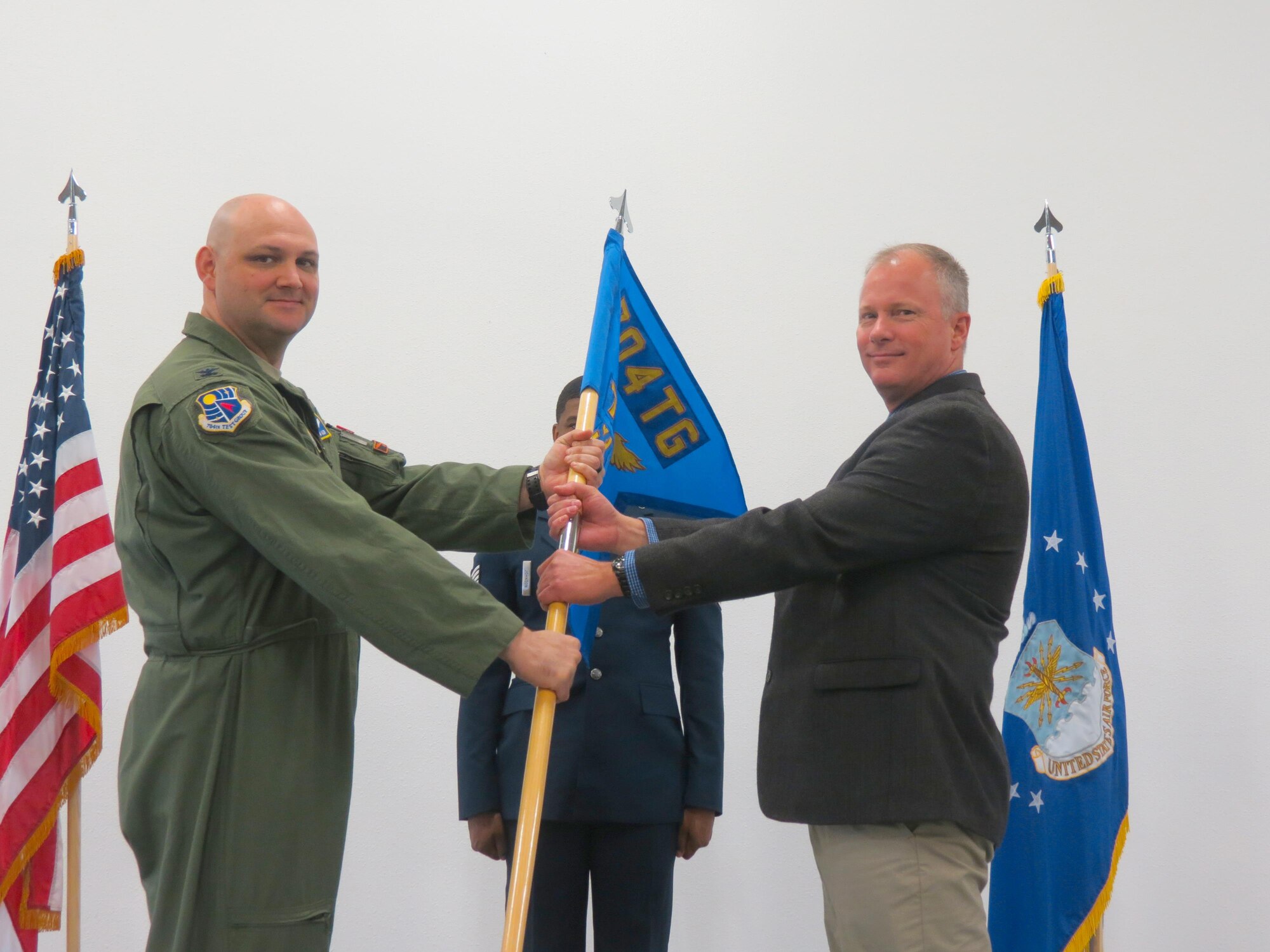Col. Andrew Allen, commander of the 704th Test Group, appoints the command responsibility of the 704th Test Support Squadron to Eric Lagier during a Change of Responsibility ceremony Dec. 19, 2016, at Holloman Air Force Base, N.M. The 704th TG is an AEDC organization. The 704th TSS oversees operational support to the 704th TG missions which is to operate world-class test facilities for high speed sled track testing, navigation and guidance system testing, radar signature measurements, weapon systems flight testing, and acts as the Air Force liaison for all Air Force programs tested at White Sands Missile Range. (U.S. Air Force photo/Capt. Michael Rodgers)