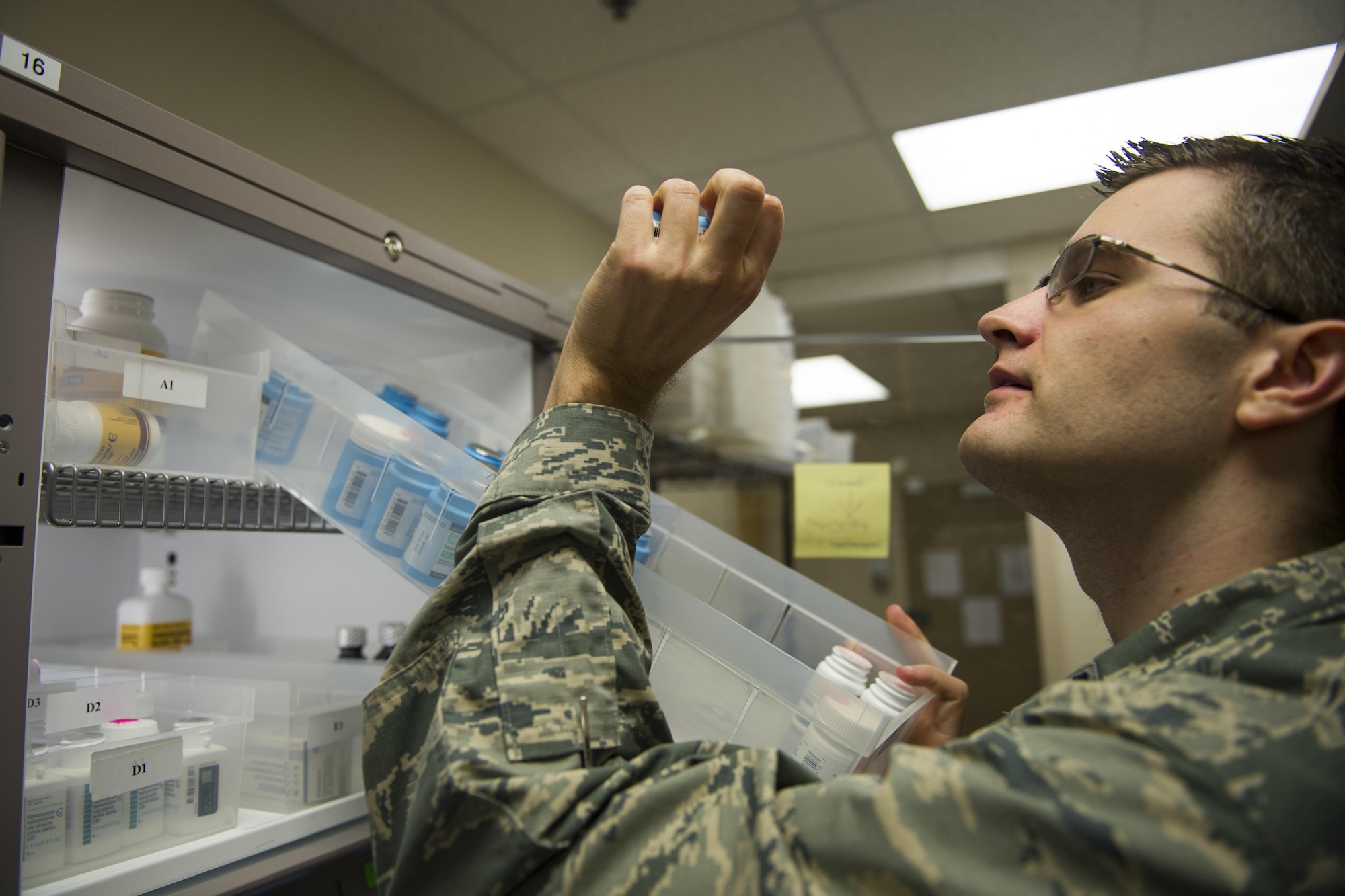 Capt. Kristofer Yaple, chief of pharmacy services for the 1st Special Operations Medical Support Squadron, verifies a medication for a prescription at Hurlburt Field, Fla., Jan. 10, 2017. The 1st SOMDSS typically fills more than 900 prescriptions a day. (U.S. Air Force photo by Airman 1st Class Joseph Pick)