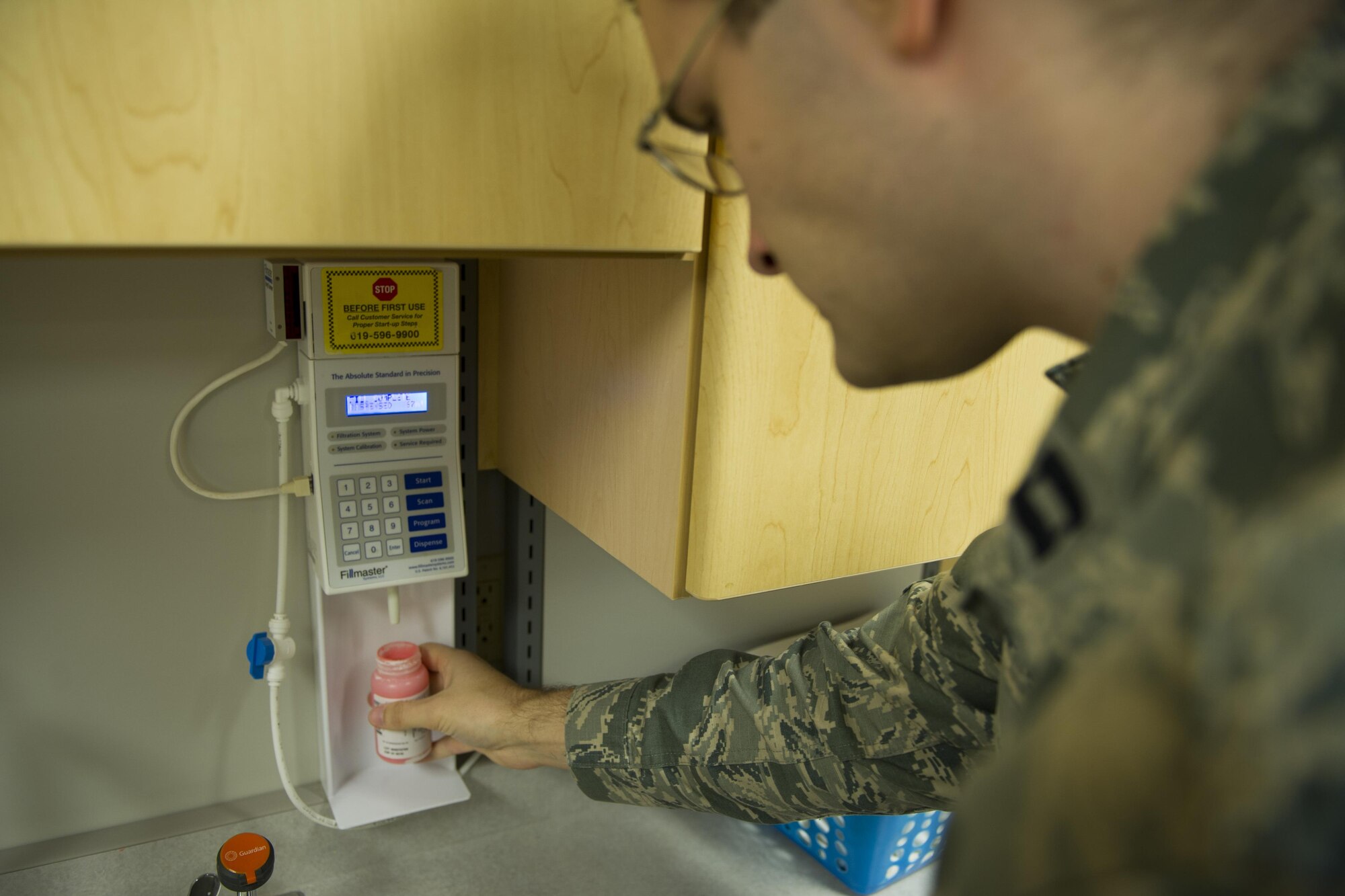 Capt. Kristofer Yaple, chief of pharmacy services for the 1st Special Operations Medical Support Squadron, mixes water with powdered amoxicillin for a prescription at Hurlburt Field, Fla., Jan. 10, 2017. Amoxicillin is an antibiotic that is used to treat different types of bacterial infections. (U.S. Air Force photo by Airman 1st Class Joseph Pick)