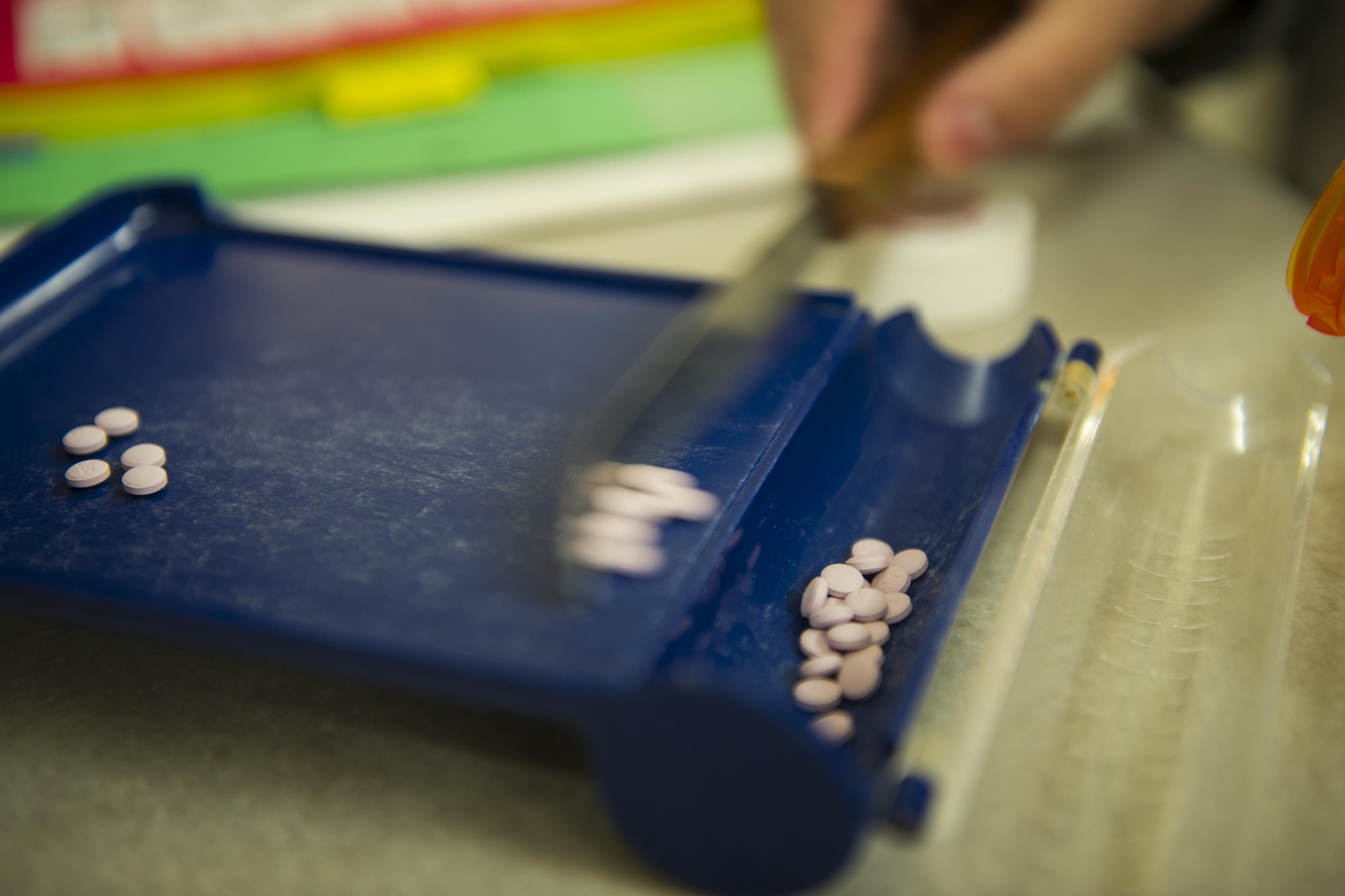 Medication for a prescription is separated and counted at the 1st Special Operations Medical Support Squadron pharmacy on Hurlburt Field, Fla., Jan. 10, 2017. The 1st SOMDSS typically fills more than 900 prescriptions a day. (U.S. Air Force photo by Airman 1st Class Joseph Pick)