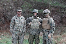 Marine Corps Systems Command’s Capt. Christopher Kiely, Justin Miller and Maj. Paul Lee act as target detection decoys in an Infantry Equipping Challenge evaluation exercise in December aboard Marine Corps Base Quantico, Va. MCSC engineers conducted target detection speed trials with combat instructors from the School of Infantry–East to evaluate how fast the instructors could detect the decoys, who were outfitted in varying camouflage gear.  (U.S. Marine Corps photo by Ashley Calingo) 