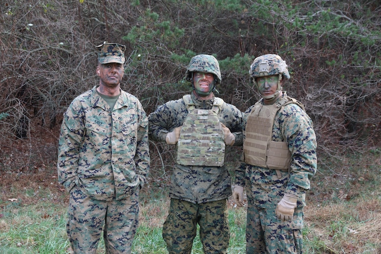 Marine Corps Systems Command’s Capt. Christopher Kiely, Justin Miller and Maj. Paul Lee act as target detection decoys in an Infantry Equipping Challenge evaluation exercise in December aboard Marine Corps Base Quantico, Va. MCSC engineers conducted target detection speed trials with combat instructors from the School of Infantry–East to evaluate how fast the instructors could detect the decoys, who were outfitted in varying camouflage gear.  (U.S. Marine Corps photo by Ashley Calingo) 