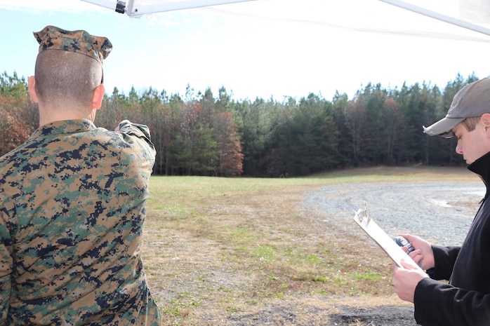 Staff Sgt. Joseph Martin with School of Infantry–East from Camp Lejeune, N.C., scouts targets in a target detection speed exercise during an Infantry Equipping Challenge event in December aboard Marine Corps Base Quantico, Va. The exercise was part of the Infantry Equipping Challenge, an ongoing effort at Marine Corps Systems Command to leverage new and emerging technologies from industry to enhance the capability of Infantry Marines. (U.S. Marine Corps photo by Ashley Calingo)