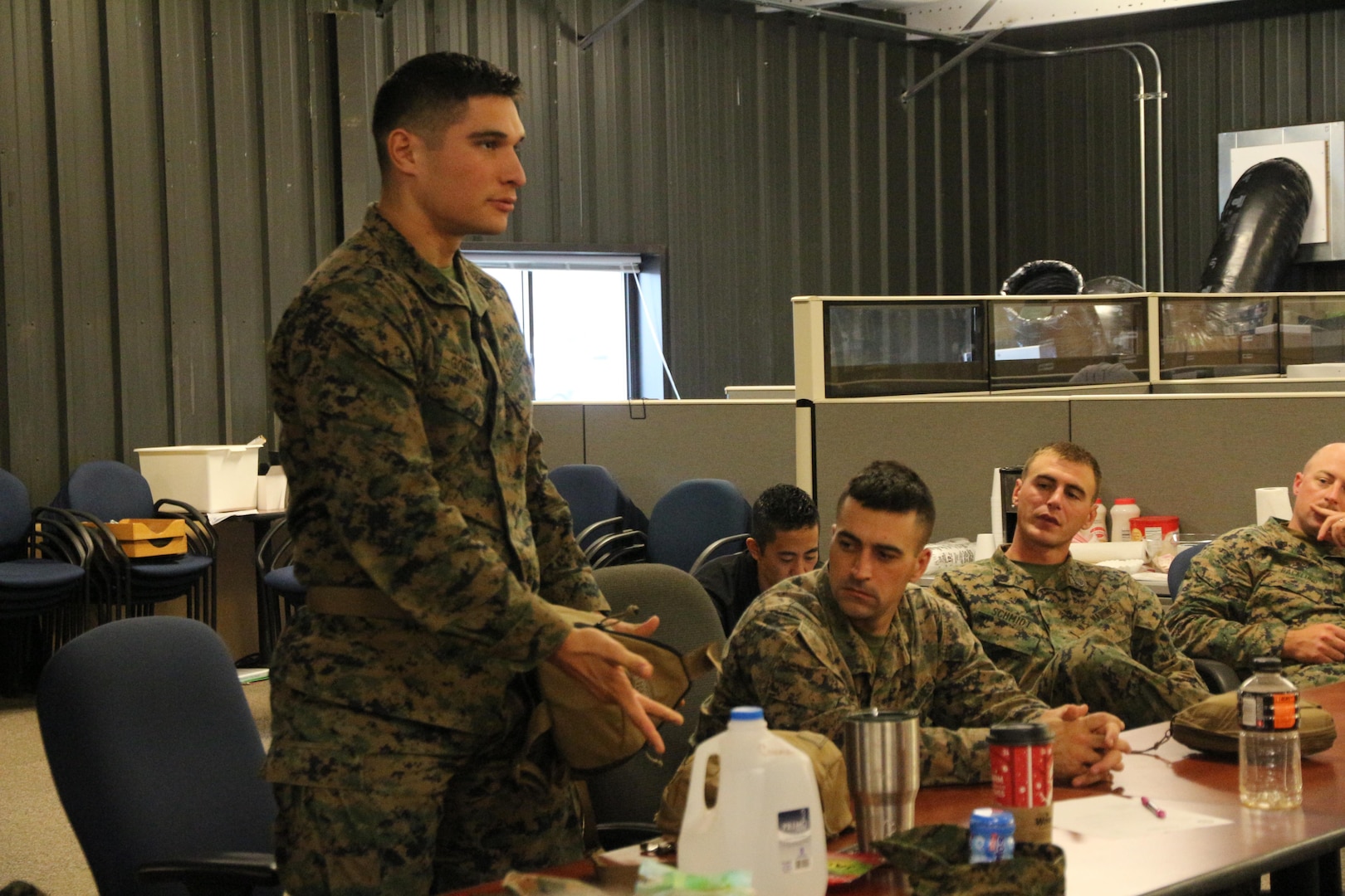 SSgt. Aldo Gongora with School of Infantry–East from Camp Lejeune, N.C., tries on an alternative gas mask carrier during an Infantry Equipping Challenge limited user evaluation in December aboard Marine Corps Base Quantico, Va. The Infantry Equipping Challenge is an ongoing effort at Marine Corps Systems Command to leverage new and emerging technologies from industry to enhance the capability of Infantry Marines. (U.S. Marine Corps photo by Ashley Calingo)