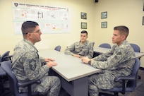 Senior Master Sgt. Lloyd Stinson, 502nd Air Base Wing, 902nd Security Forces Logistics Readiness Squadron, deputy fire chief, mentors Senior Airman Brice Haylett and Staff Sgt. Allen Roby at Joint Base San Antonio-Randolph, Jan. 11.  Mentoring is a critical component for members of the Air Force. It is normally a relationship in which a person with greater experience and wisdom guides another person to develop both personally and professionally.