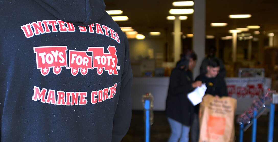 Marines with the Marine Corps Toys for Tots Program distribute toys in Albany, Ga., Dec. 20, 2016.