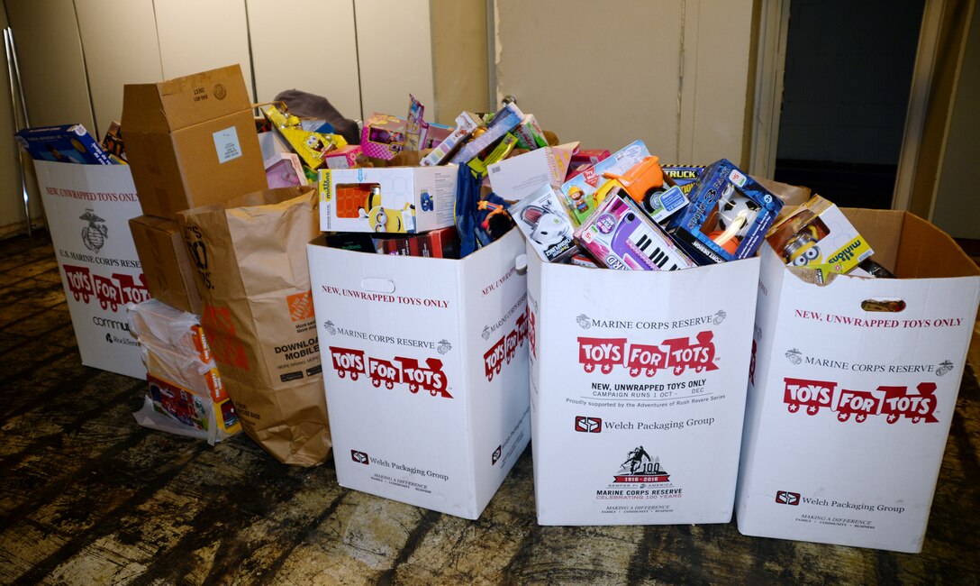 Toys for Tots bins overflow with toys from the local community at the Albany, Ga., distribution site Dec. 20, 2016.