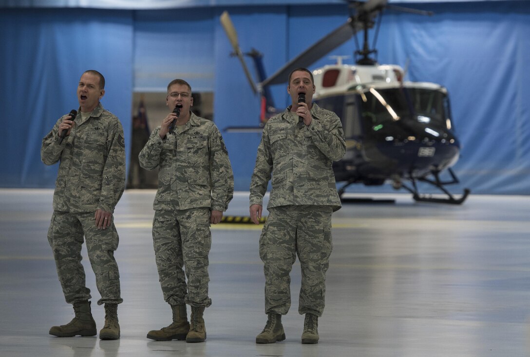 Members of the U.S. Air Force Band’s Singing Sergeants perform during the farewell ceremony for Secretary of the Air Force Deborah Lee James at Joint Base Andrews, Md., Jan. 11, 2017. The Air Force honored James during the hour-long ceremony by acknowledging her accomplishments and thanking her for her service and contributions to the welfare of members across the service. (U.S. Air Force photo by Senior Airman Jordyn Fetter)