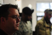 Lt. Col Jeff Bryant, the 916th Air Refueling Wing director of inspections and 4th Fighter Wing security forces personnel inspect the progress of an “active shooter” exercise on Jan. 11, 2017, at Seymour Johnson Air Force Base, North Carolina. (U.S. Air Force photo by Senior Airman Jeramy Moore)