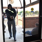 Defense Logistics Agency Installation Support at Richmond’s police Sgt. Vance Smith plays the role of active shooter in an emergency exercise on Defense Supply Center Richmond, Virginia, May 24, 2016.  An active shooter emergency exercise will take place on Jan. 19, 2017.  