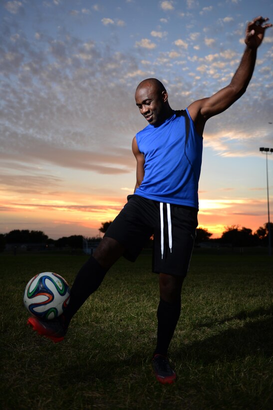 Senior Airman Jonathan Gwei, 47th Medical Support Squadron travel and referral technician, juggles a soccer ball, on Laughlin Air Force Base, Oct. 25, 2016. Gwei has secured a spot on the Air Force soccer team for his second time. (U.S. Air Force photo/Airman 1st Class Benjamin N. Valmoja)