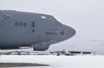 Three B-52H Stratofortress bombers are shown on a snowy flight line at the Oklahoma City Air Logistics Complex Jan. 6, 2017, Tinker Air Force Base, Oklahoma. Significant snowfall occurred overnight and in the early morning hours of Jan. 6th in the Oklahoma City region, but did not halt maintenance operations at the sprawling base. (U.S. Air Force photo/Greg L. Davis)