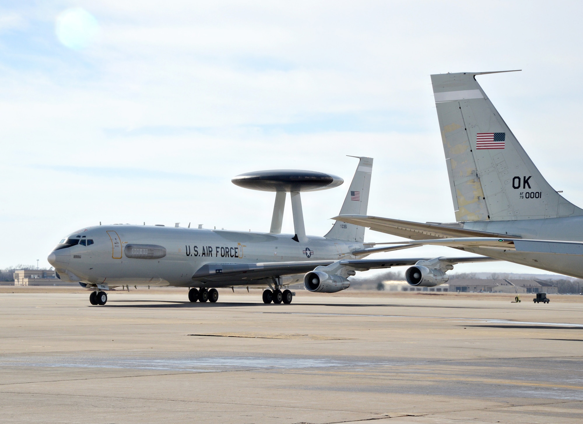 The first E-3 Sentry aircraft to complete glass flight deck modification taxis into the 552nd Air Control Wing ramp area Jan. 9, 2017.  A Boeing crew flew the plane from Boeing Field in Seattle, Wash., where the upgrade known as DRAGON was completed. (Air Force photo by Kelly White)