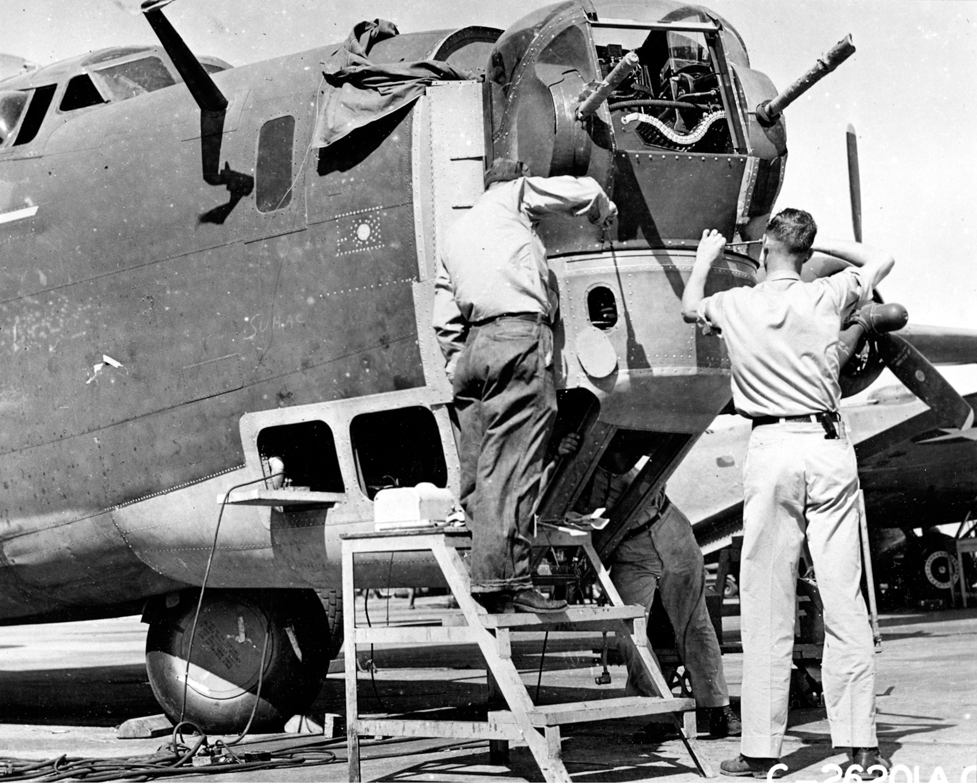 Work on a modification to the B-24D nose turret takes place at Tinker Field. The major modification on 65 B-24D Liberators began July 15, 1943. (Photo courtesy of Tinker History Office)