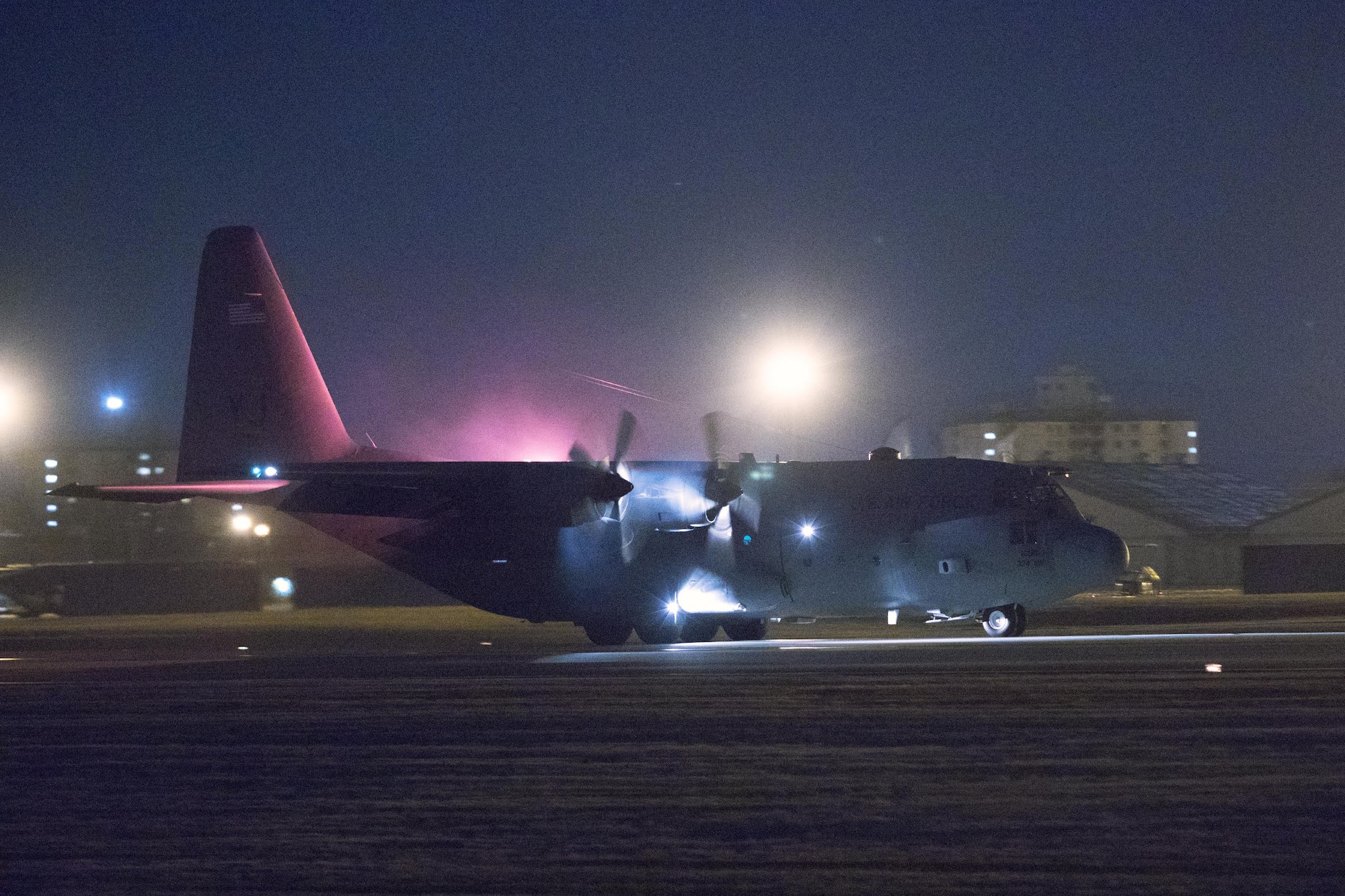 A C-130 Hercules lands at Yokota Air Base, Japan, Jan. 11, 2017, during Jump Week. The 36th Airlift Squadron provided airlift support to the U.S. Marine Corp’s weeklong jump training. (U.S. Air Force photo by Yasuo Osakabe/Released)