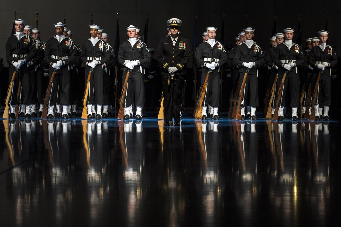 The U.S. Navy Ceremonial Guard assigned to Naval District Washington, D.C., stands in formation during Defense Secretary Carter's farewell ceremony at Joint Base Myer-Henderson Hall, Va., Jan. 9, 2016. DoD photo by EJ Hersom