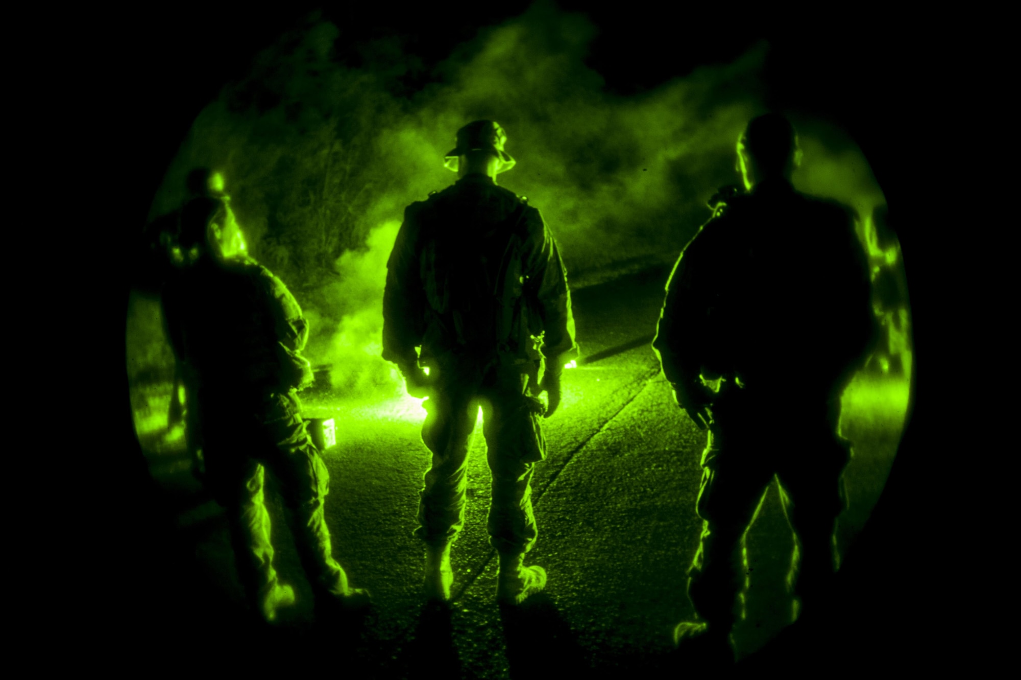 U.S. Air Force Airmen from the 17th Special Operations Squadron light flares during a combat survival training exercise, Jan. 6, 2017, at Camp Hansen, Japan. Combat survival training is for aircrew members to retain currency on a course they are required to have every three years. (U.S. Air Force photo by Airman 1st Class Nick Emerick/Released)