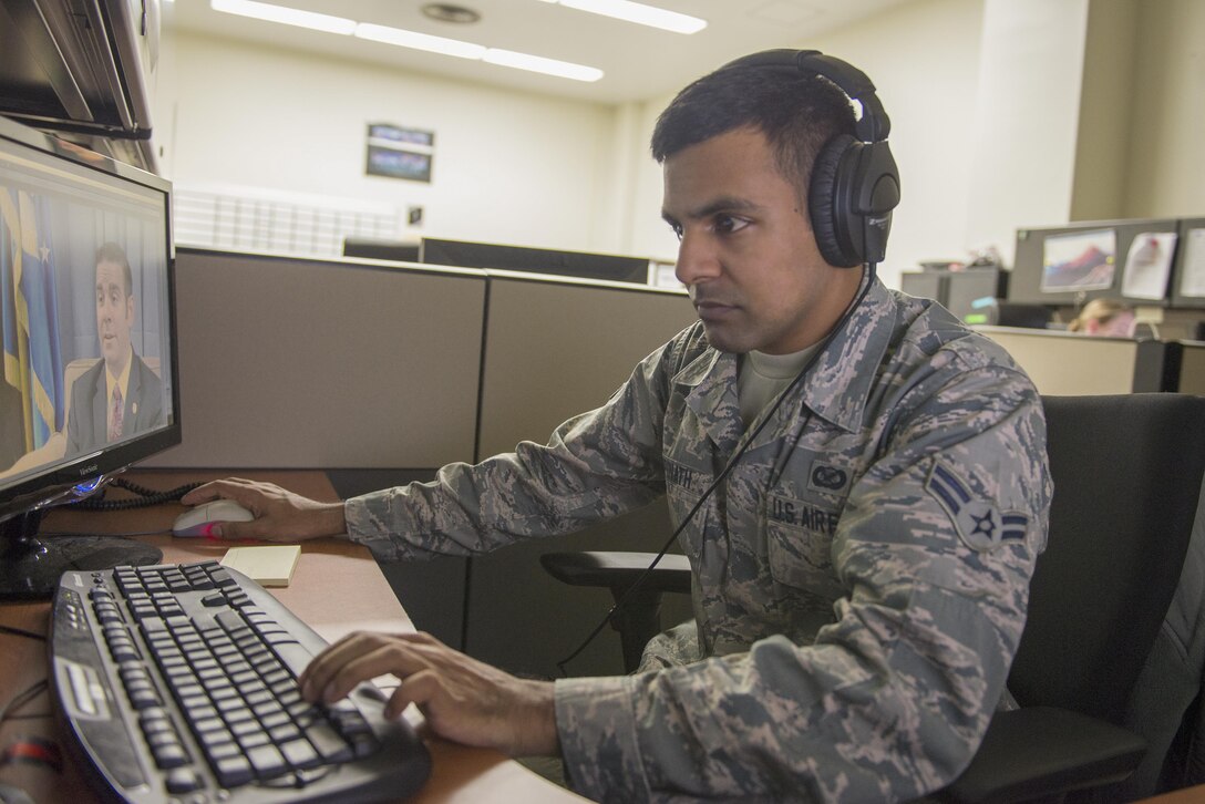 Airman 1st Class Dhruv Gopinath, American Forces Network Tokyo broadcaster, edits video footage at Yokota Air Base, Japan, Jan. 9, 2017. Gopinath was one of five Airmen at Yokota to receive a promotion through the Senior Airman Below-the-Zone Promotion Board. (U.S. Air Force photo by Senior Airman David C. Danford)