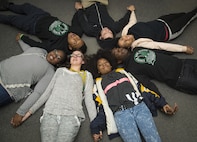 Edgren High School students join hands as they pose representing the realization of Martin Luther King Jr.’s dream of equality at Misawa Air Base, Japan, Jan. 12, 2017. King’s speech included his dream to see equality in the schools and end laws like “Plessy v. Ferguson”, which mandated “Separate but equal” treatment between Caucasian and African-American people. (U.S. Air Force photo by Airman 1st Class Sadie Colbert)