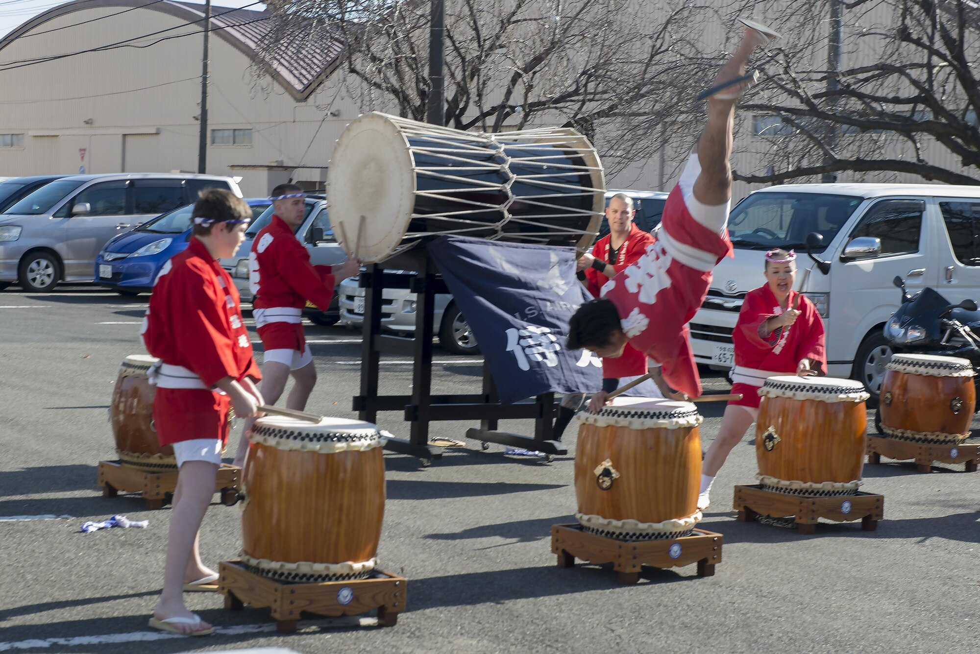 The Samurai Taiko Drum Team performs during the Japan Culture Day event hosted by the Japanese Welfare Association at Yokota Air Base, Japan, Jan. 13, 2017. The event also included traditional festival food, musicians playing the koto and shamisen and tea ceremonies. (U.S. Air Force photo by Senior Airman David C. Danford)