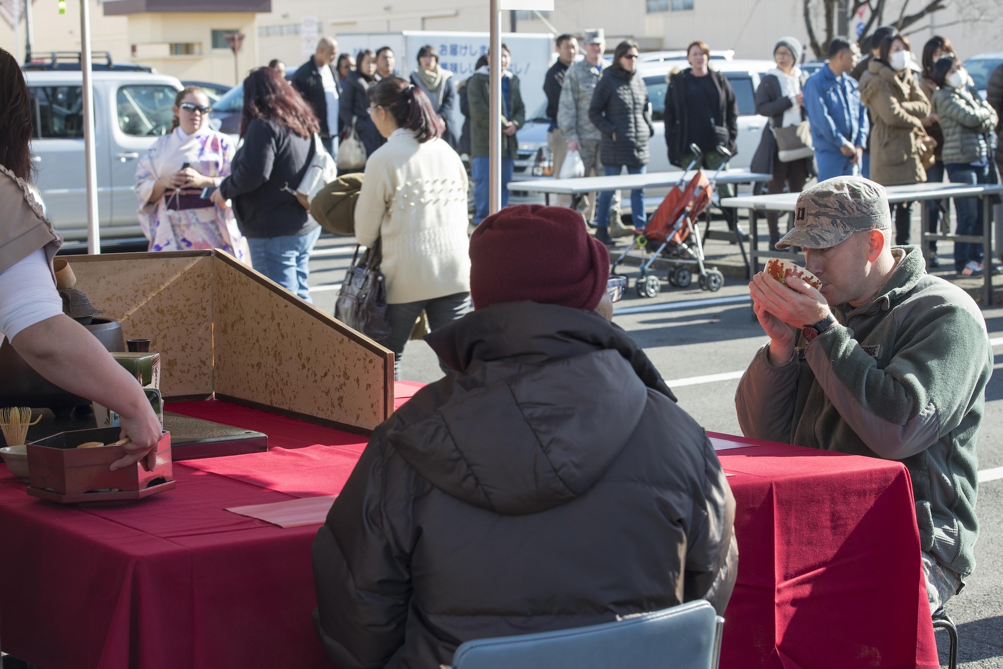 Yokota members participate in the Japan Culture Day event hosted by the Japanese Welfare Association at Yokota Air Base, Japan, Jan. 13, 2017. The event included traditional festival food, a performance from the Samurai Taiko Drum Team, musicians playing the koto and shamisen and tea ceremonies. (U.S. Air Force photo by Senior Airman David C. Danford)