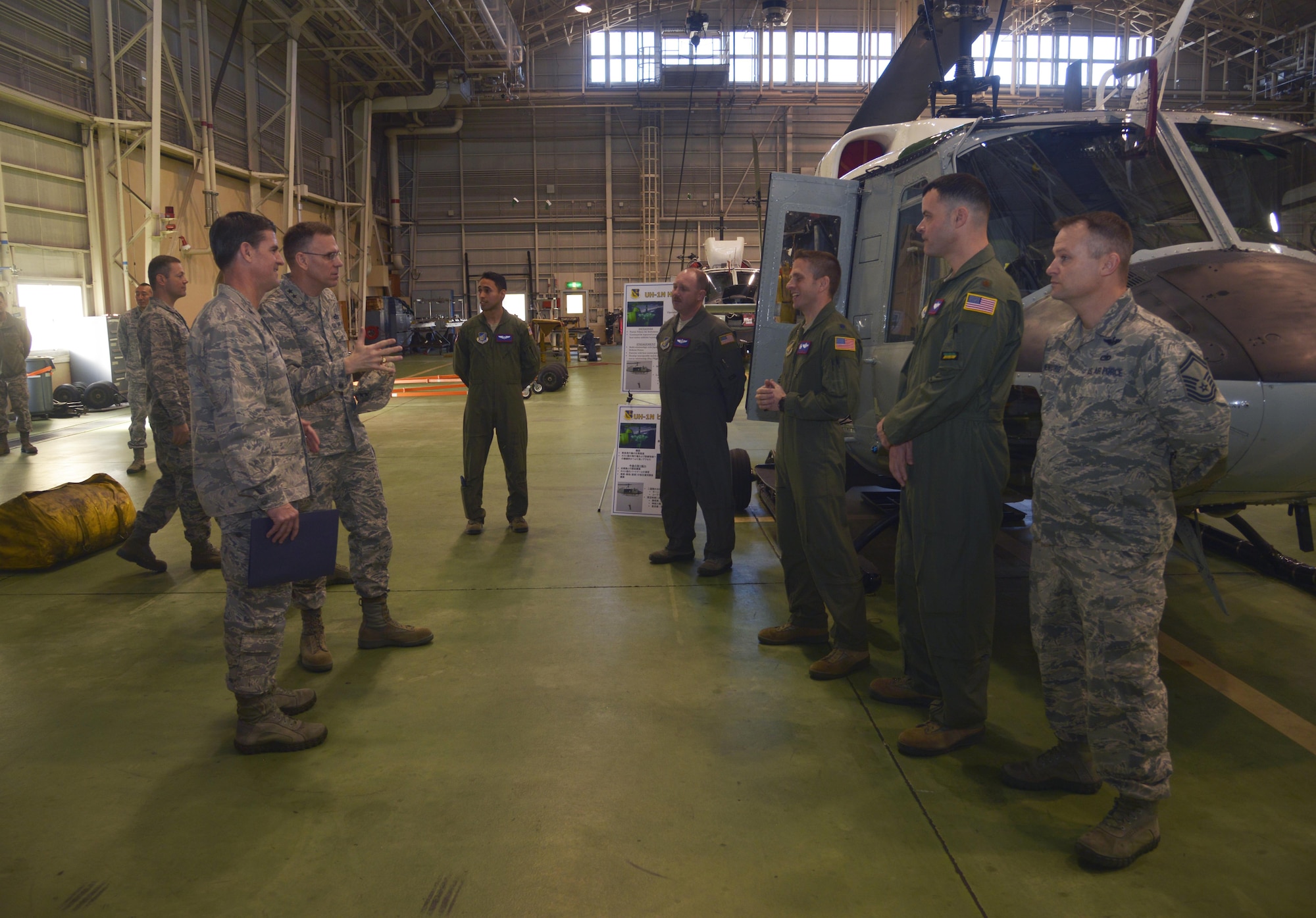 Members of the Commander in Chief’s Installation Excellence Award team receive a mission briefing from 459th Airlift Squadron members during their visit to Yokota Air Base, Japan, Jan. 12, 2017. During their time on base, the team viewed how well Team Yokota performs as a whole to provide services to upkeep the quality of life and unit morale at Yokota. The award period covers Oct. 1, 2015 – Sept. 30, 2016. (U.S. Air Force photo by Staff Sgt. David Owsianka)