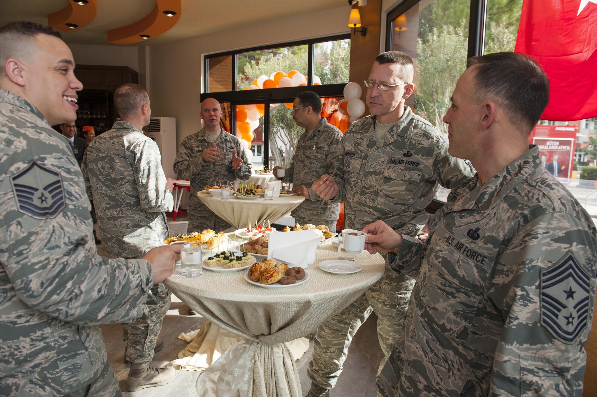Leadership from the 39th Air Base Wing(ABW) partake in pastries made by PAK FIRIN bakery during their grand opening ceremony Jan. 11, 2017, at Incirlik Air Base, Turkey. Members of the 39th ABW leadership were invited to partake in the grand opening of the Turkish PAKFIRIN bakery by the 10th Tanker Base commander Brig. Gen. Ismail Gunaydin. (U.S. Air Force photo by Staff Sgt. Jack Sanders)