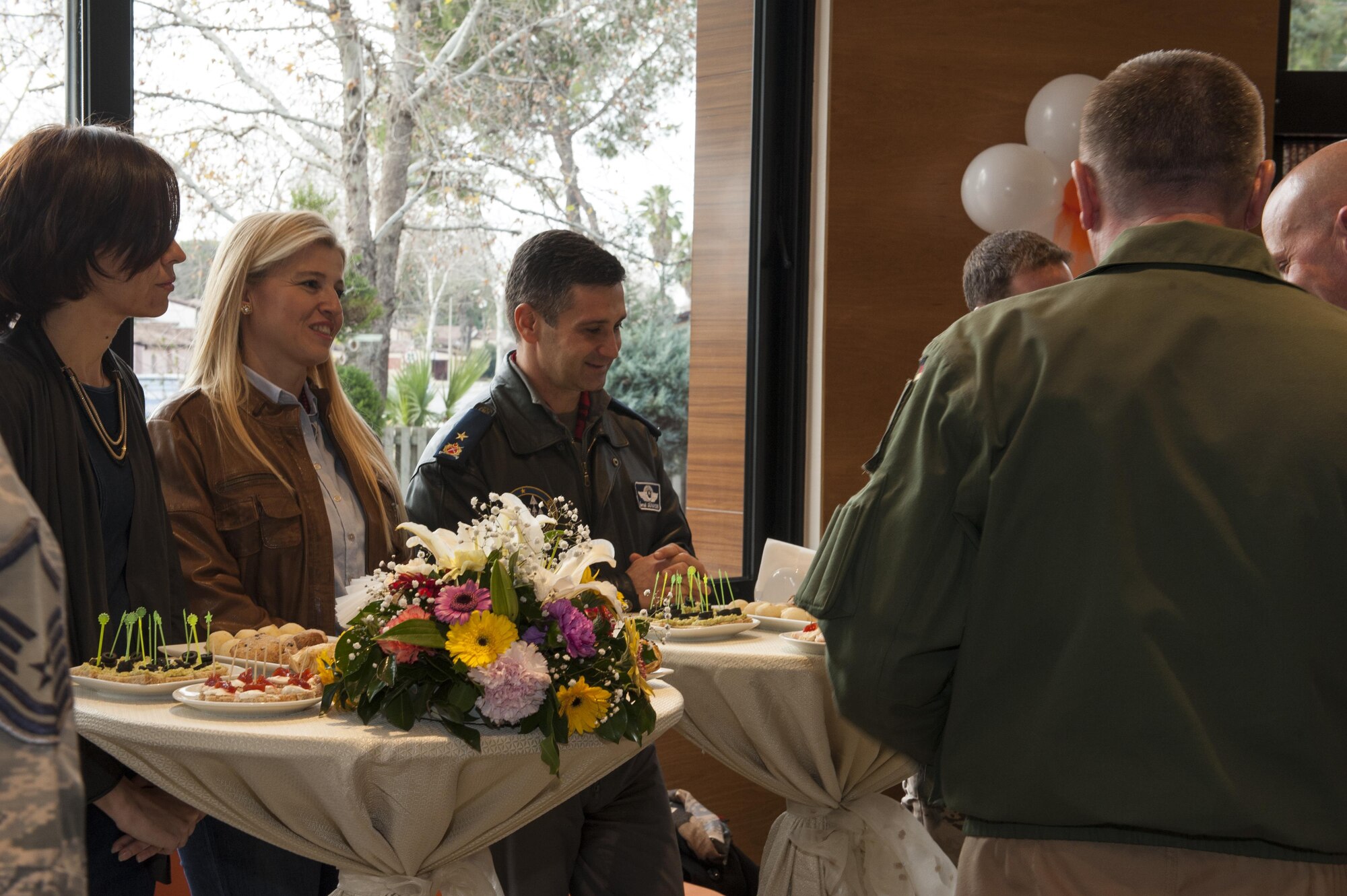 Incirlik Air Base leadership partake in pastries made by PAKFIRIN bakery during their grand opening ceremony Jan. 11, 2017, at Incirlik Air Base, Turkey. Brig. Gen. Ismail Gunaydin, 10th Tanker Base commander invited members of the 39th Air Base Wing leadership to celebrate the opening. (U.S. Air Force photo by Staff Sgt. Jack Sanders)