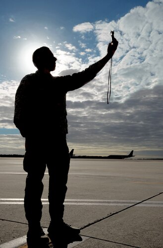 Senior Airman Jonathan Casillas, a weather forecaster assigned to the 6th Operations Support Squadron, uses a Kestrel pocket weather tracker to monitor the current weather at MacDill Air Force Base, Fla., Jan 11, 2017. Weather forecasters use the Kestrel to help provide accurate weather measurements. (U.S. Air Force photo by Airman 1st Class Adam R. Shanks)